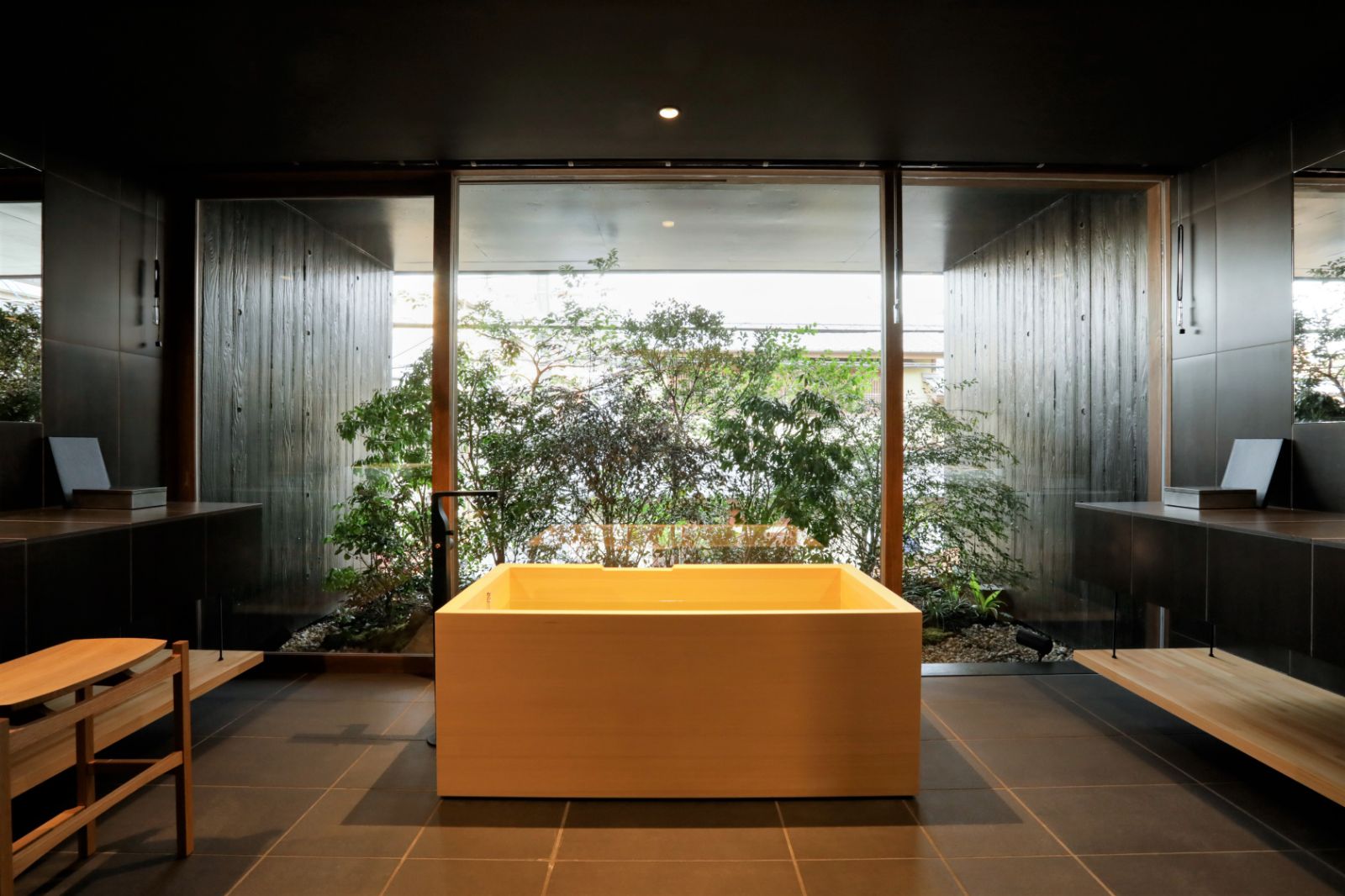 Bathtub in a guest bathroom at Sowaka ryokan in Kyoto, Japan