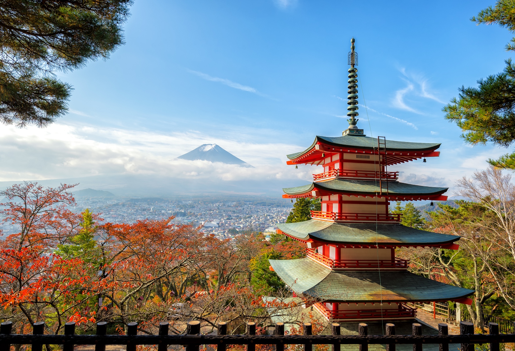 The five storied Chureito Pagoda on the mountainside overlooking Fujiyoshida City and Mount Fuji 