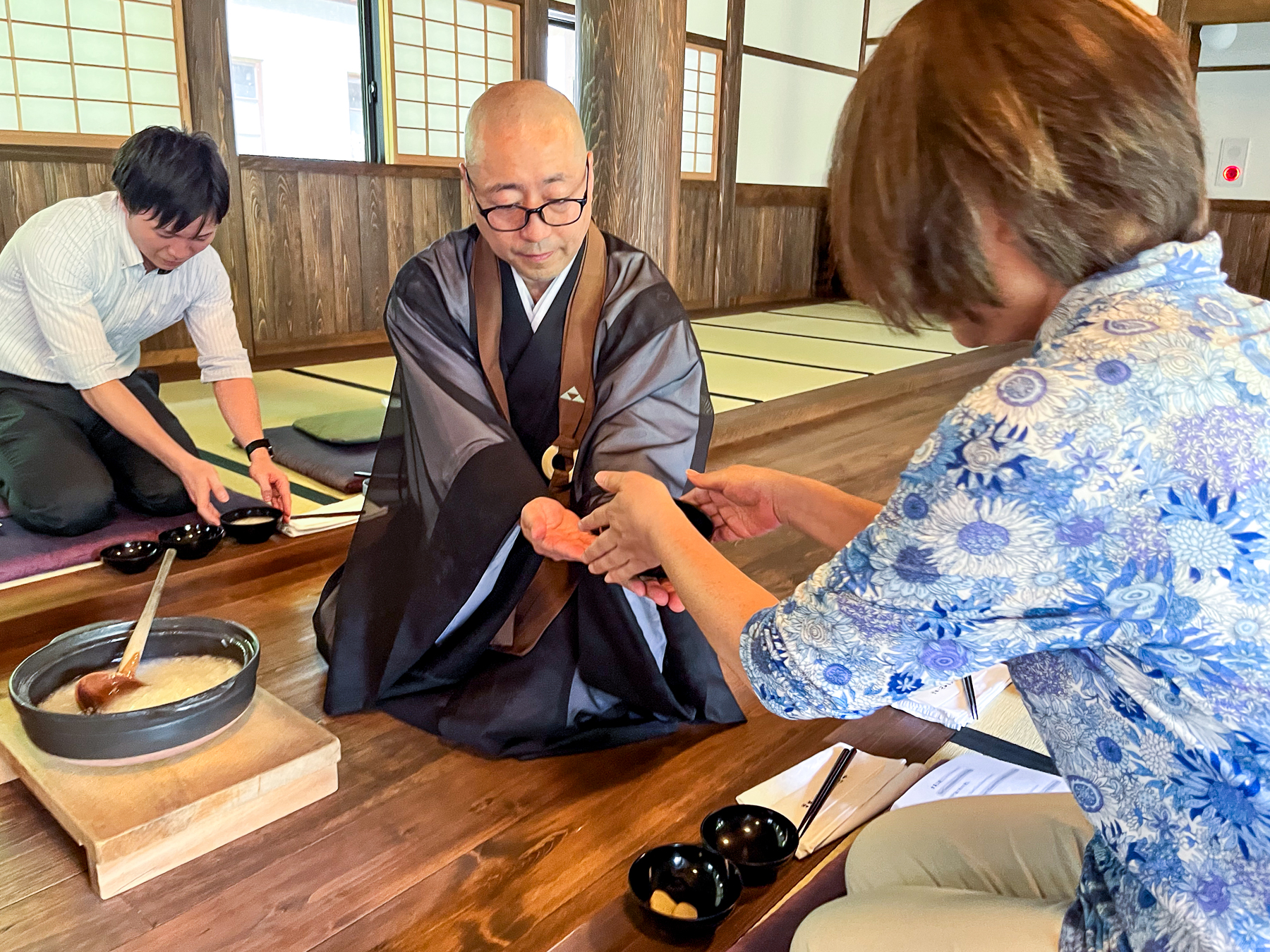 A monk handing out breakfast at Engakuji Temple in Kanagawa
