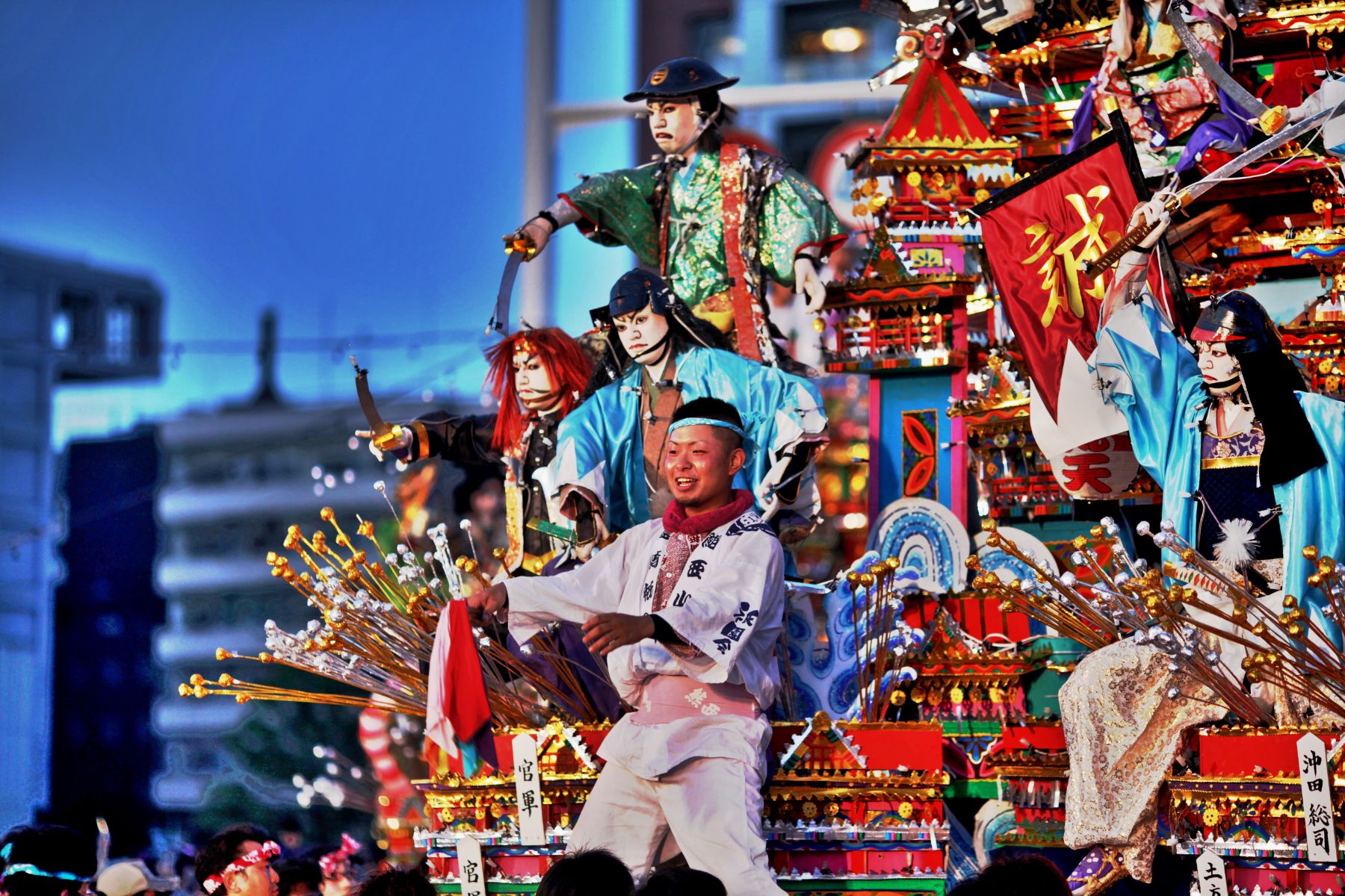 Performers on a float at a traditional Japanese festival