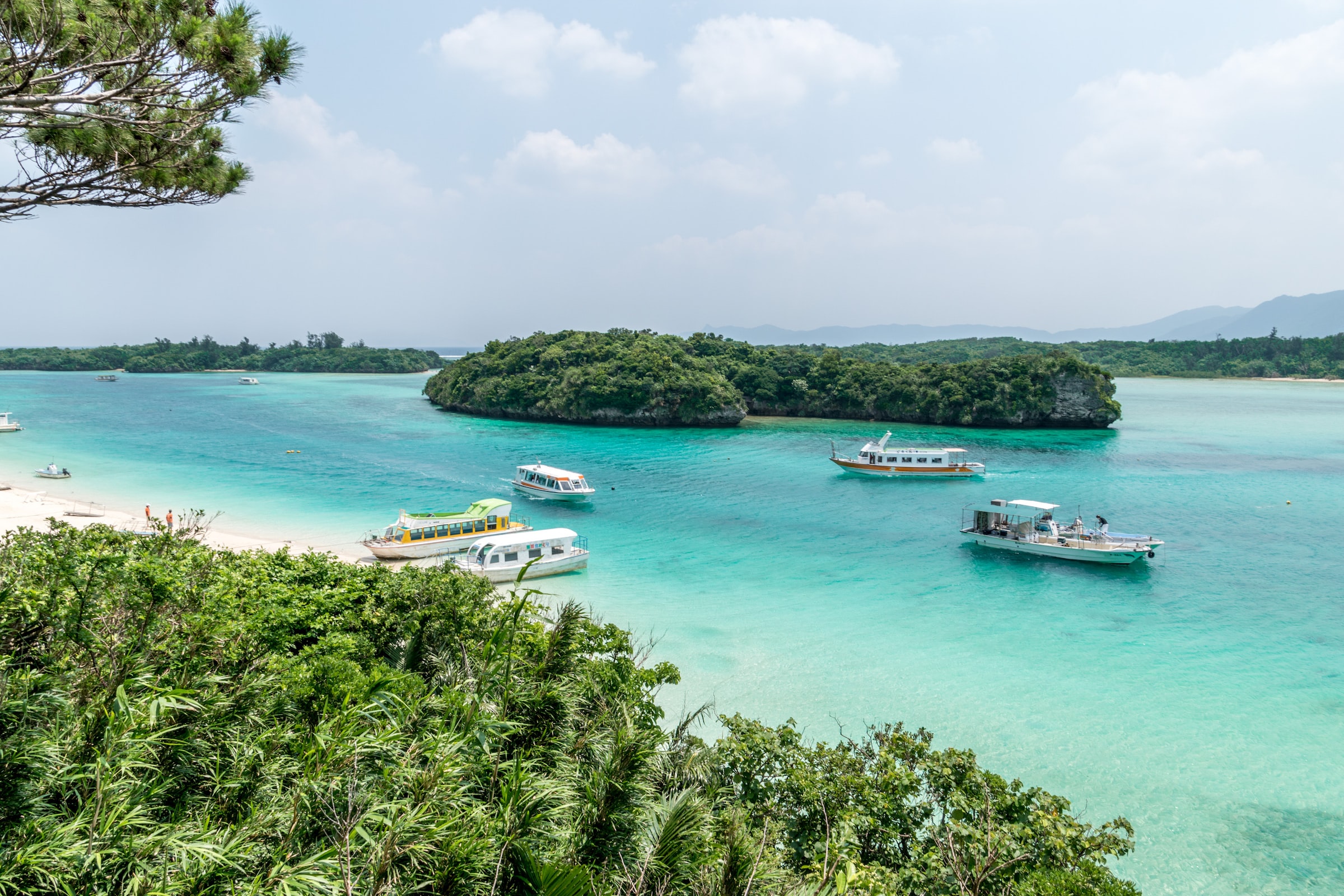 Boats in the sea surrounding Okinawa Island