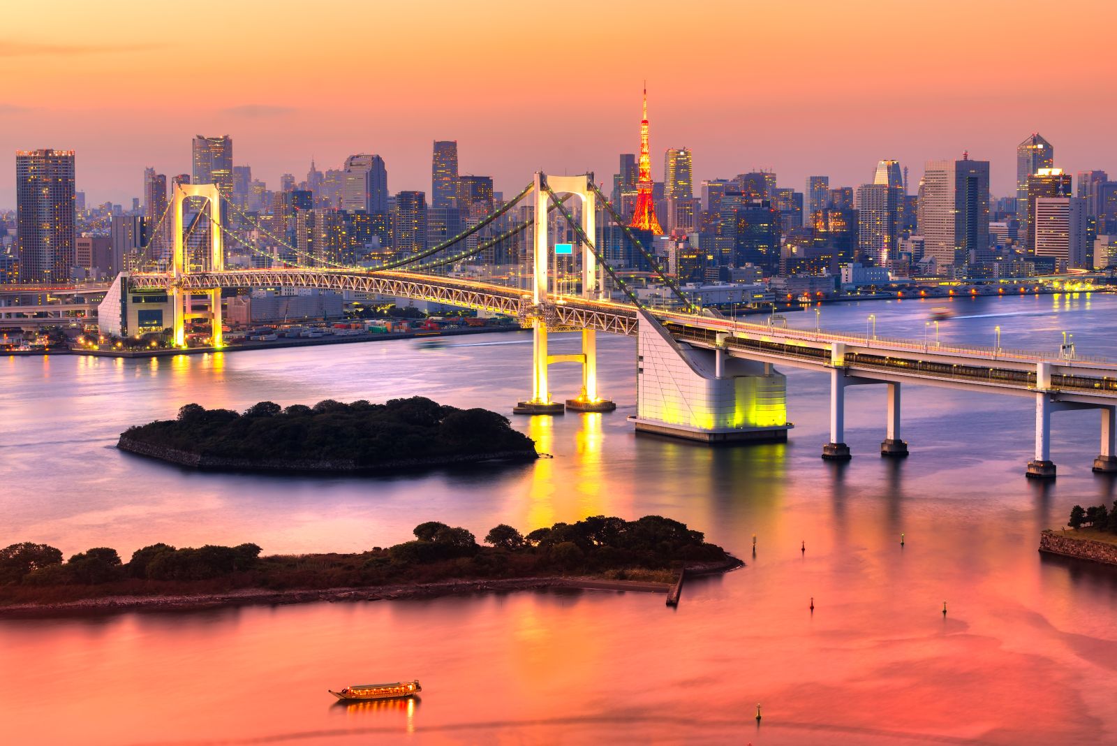 The Rainbow Bridge in Toyko illuminated at sunset