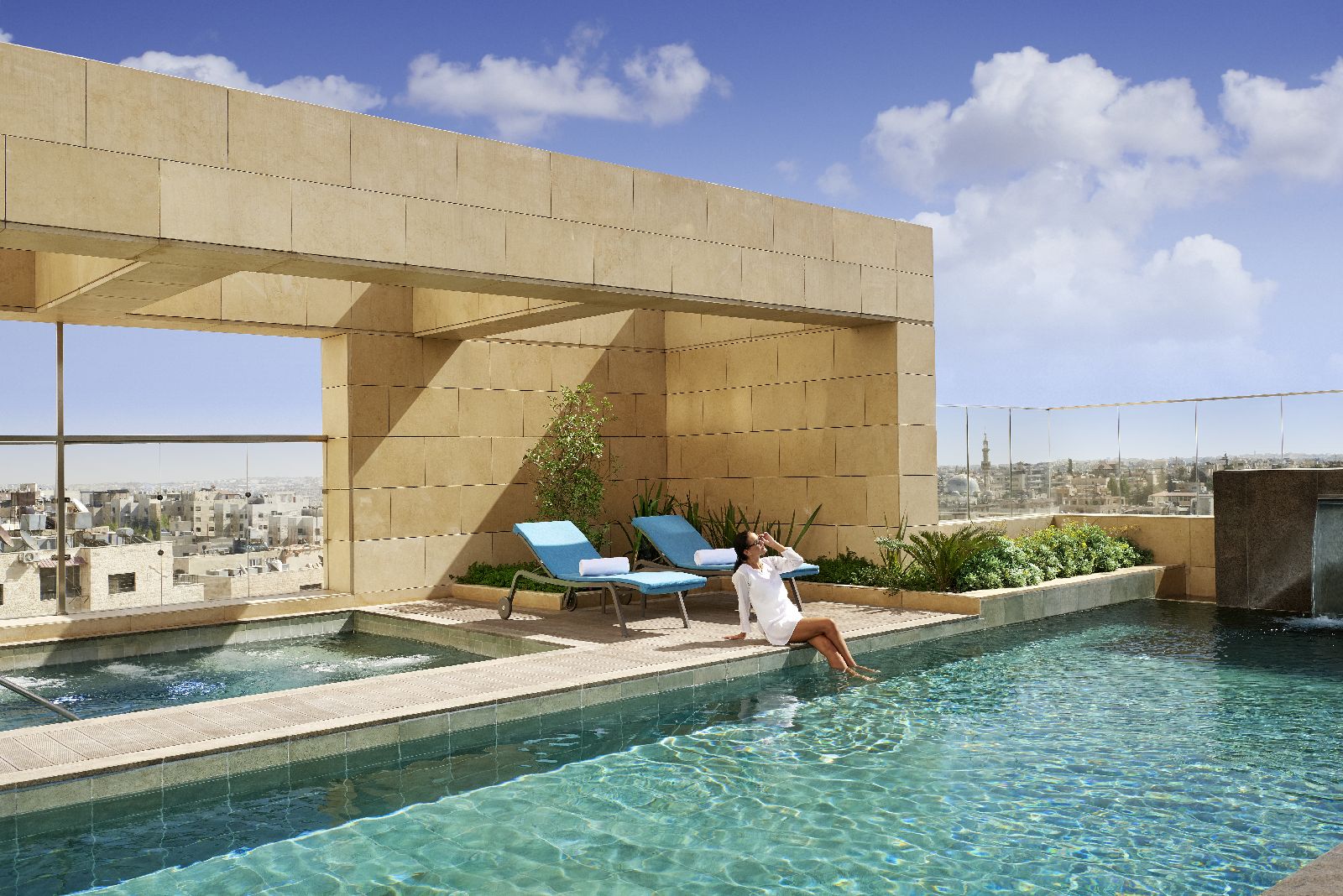 Swimming pool with city views at the Fairmont Amman Jordan