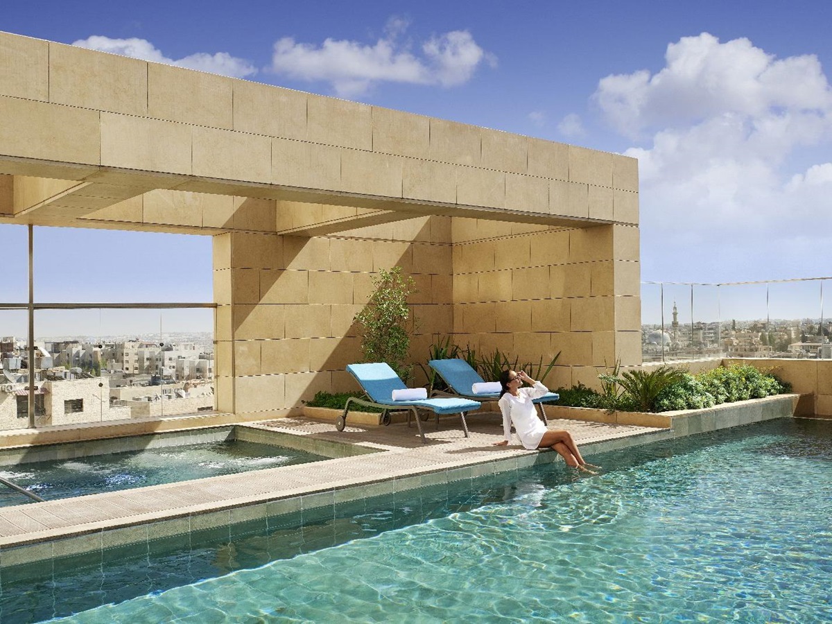 Swimming pool with city views at the Fairmont Amman Jordan