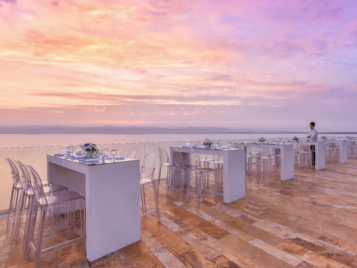 Outdoor dining terrace at the Kempinski Ishtar Dead Sea in Jordan