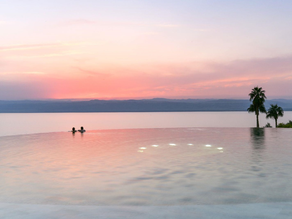 The infinity pool at sunset at the Kempinski Ishtar Dead Sea in Jordan