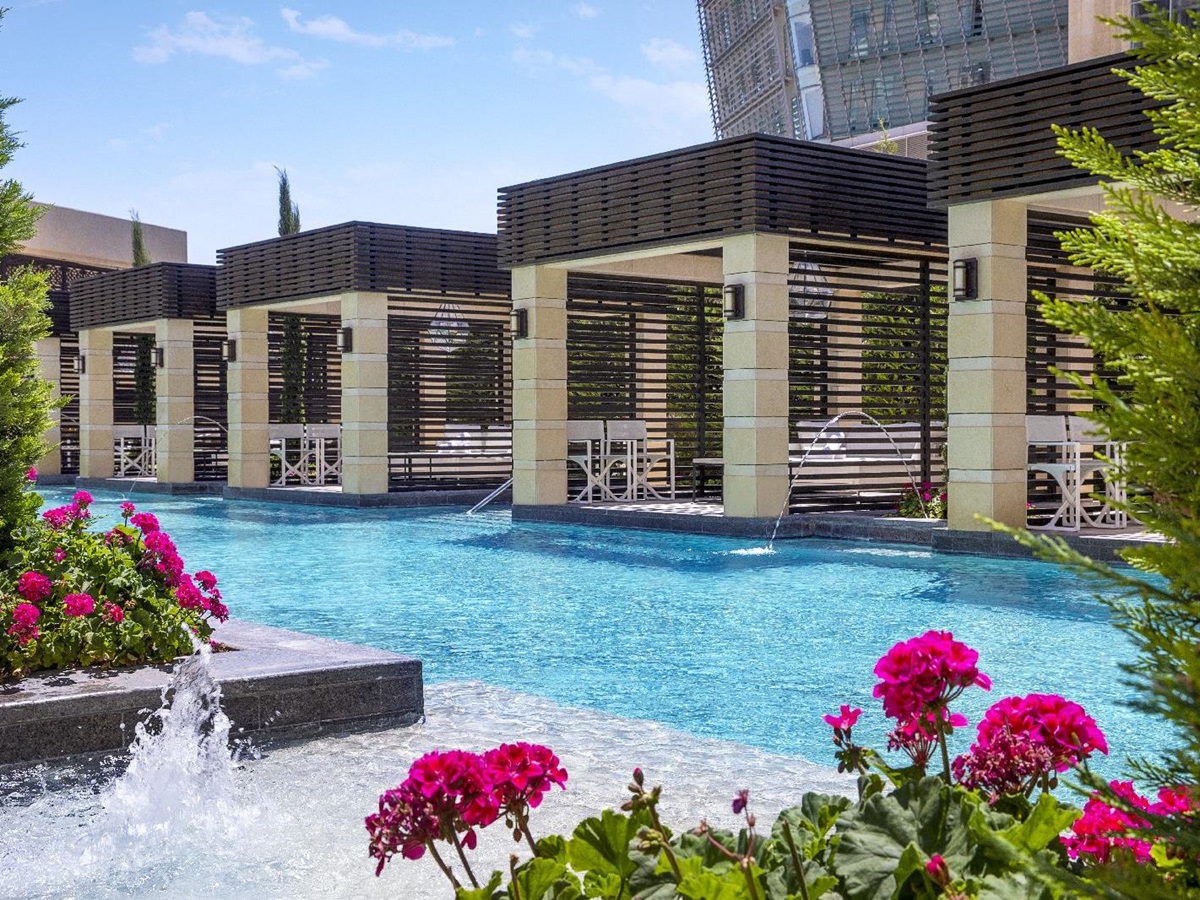 Swimminh pool and day beds at the St Regis Amman Jordan