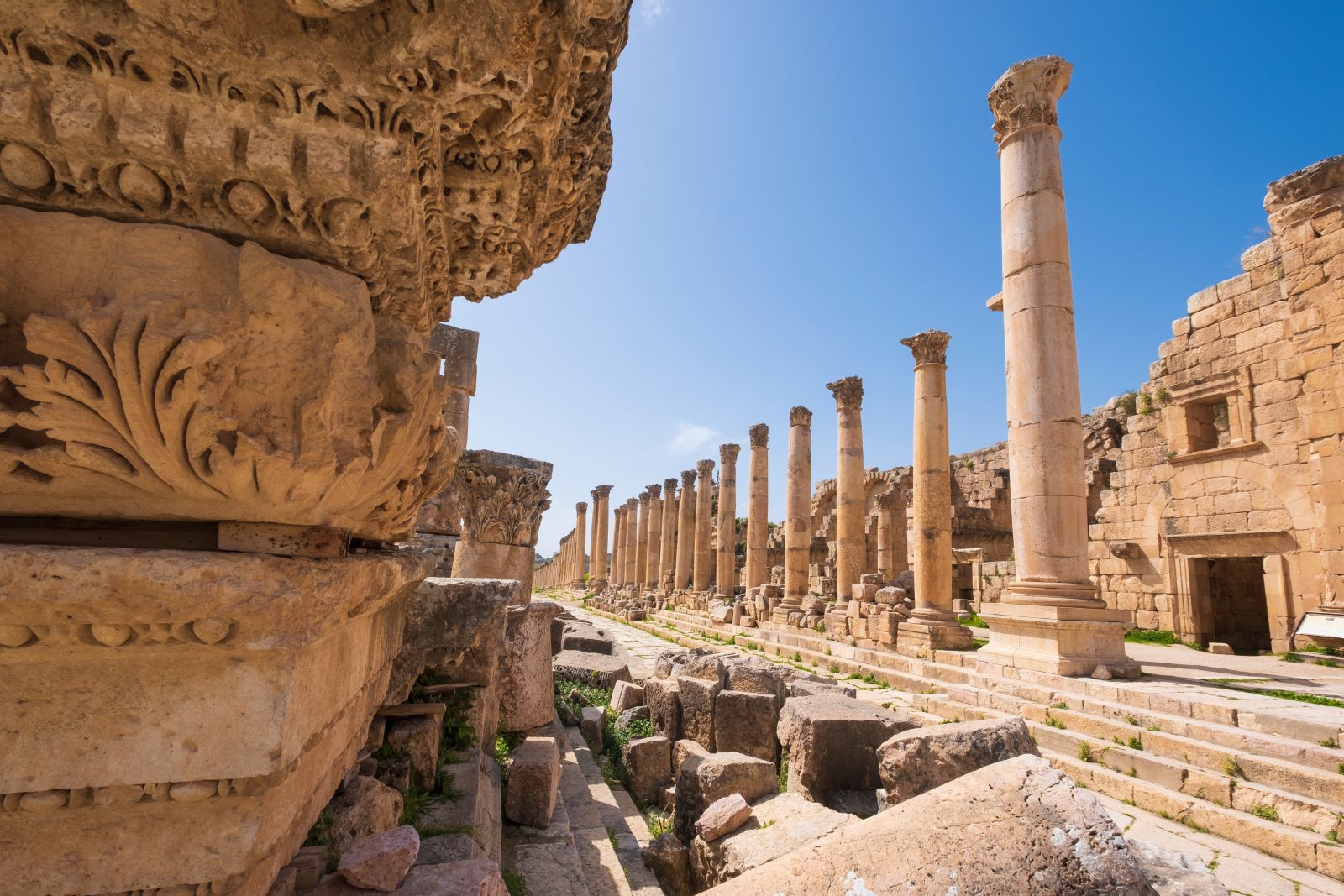 Intricate stone carvings on the columns of Jerash in Jordan