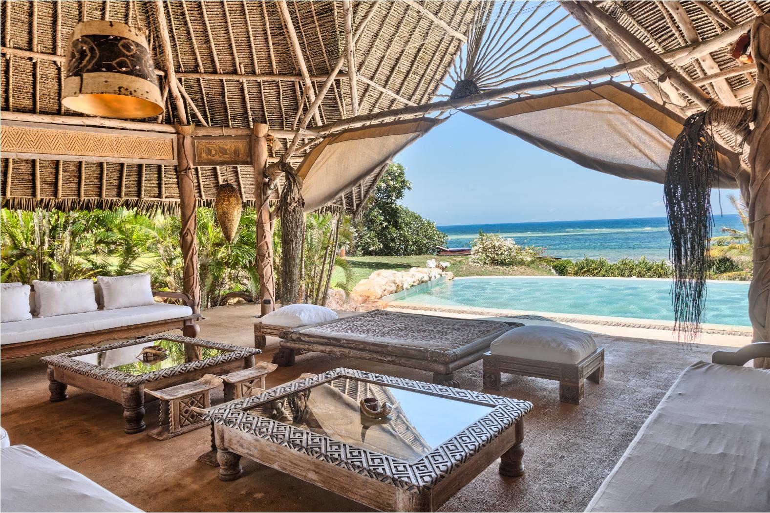 the living room and pool of the garden villa at Alfajiri, Kenya