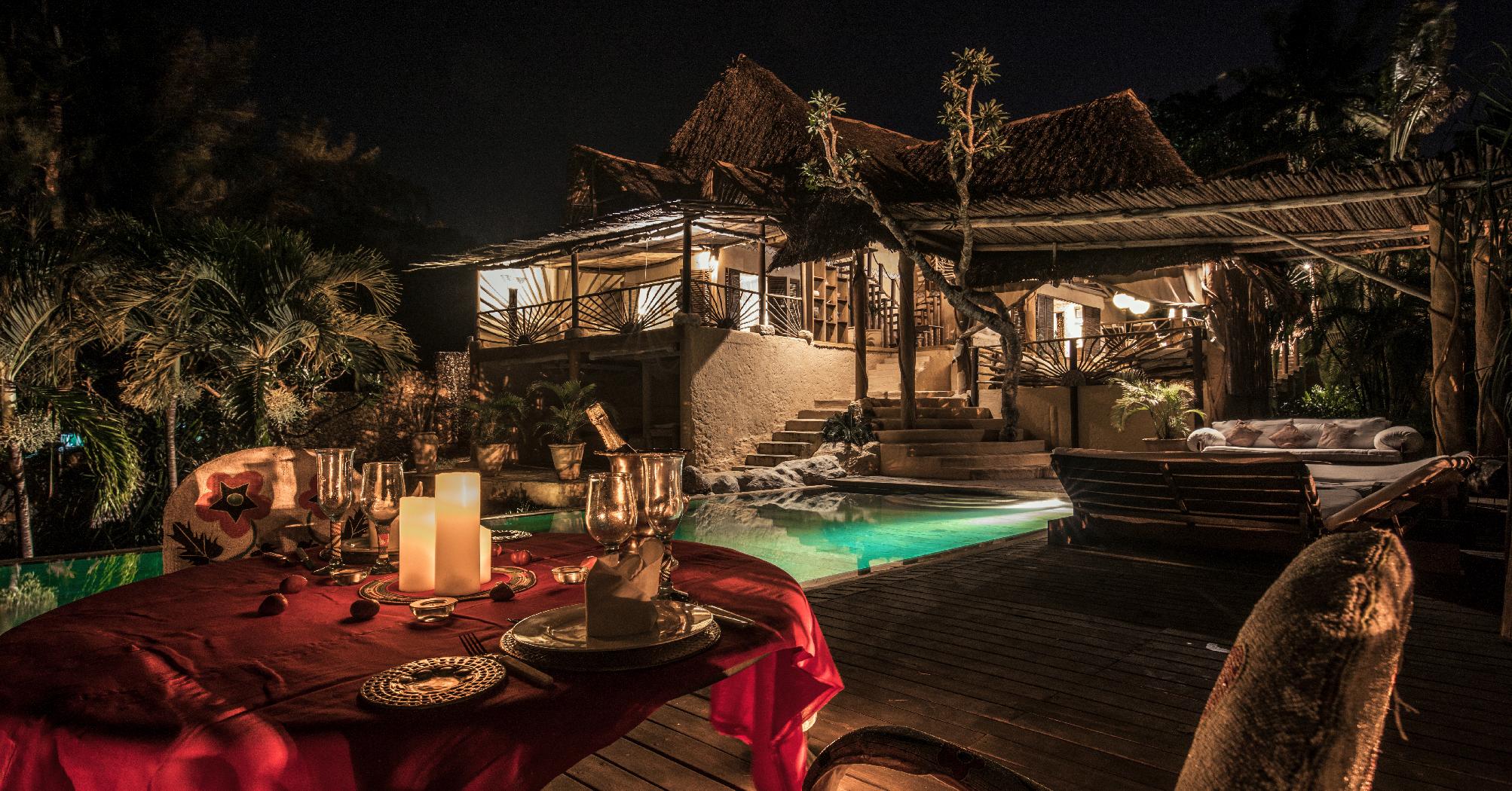 Night dining at the Beach Villa of Alfajiri Villa, Kenya