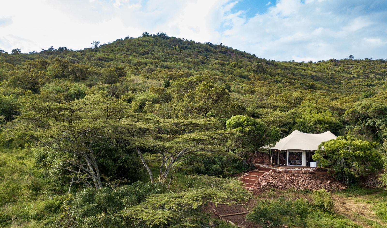 Exterior view of a guest tent at Cottars 1920s Camp in the Maasai Mara