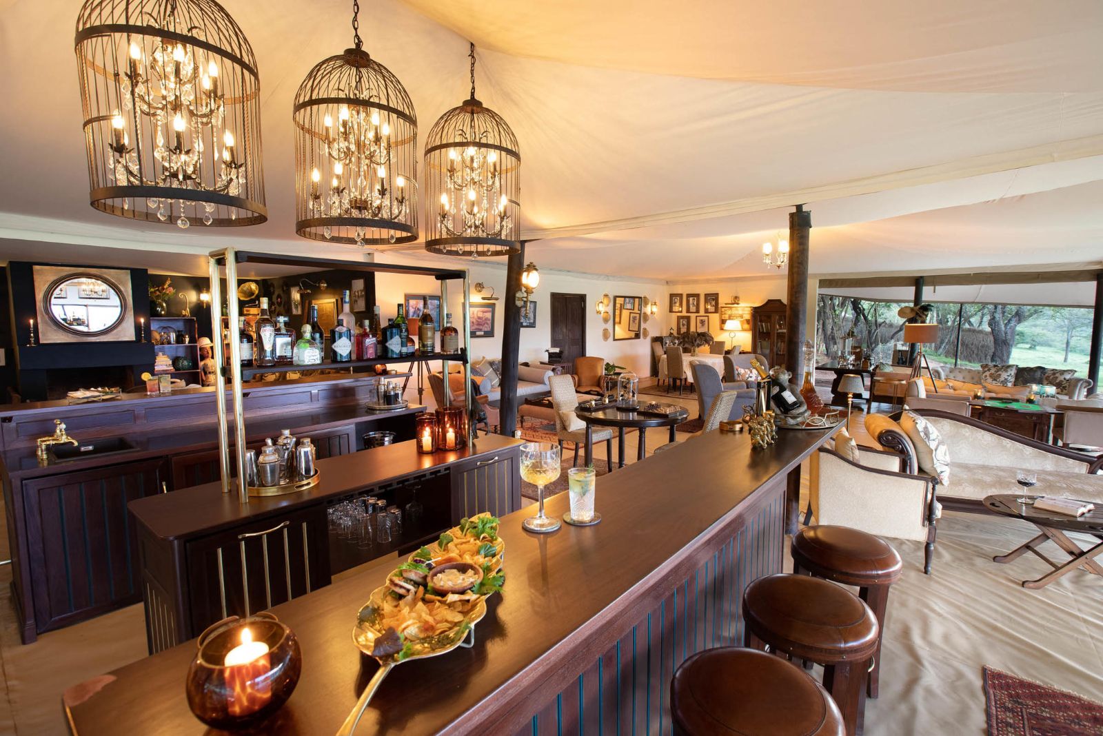 Tented bar at luxury lodge Cottar's 1920s Camp in the Maasai Mara, Kenya
