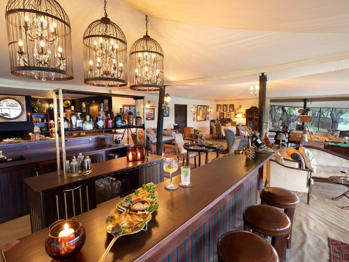 Tented bar at luxury lodge Cottar's 1920s Camp in the Maasai Mara, Kenya