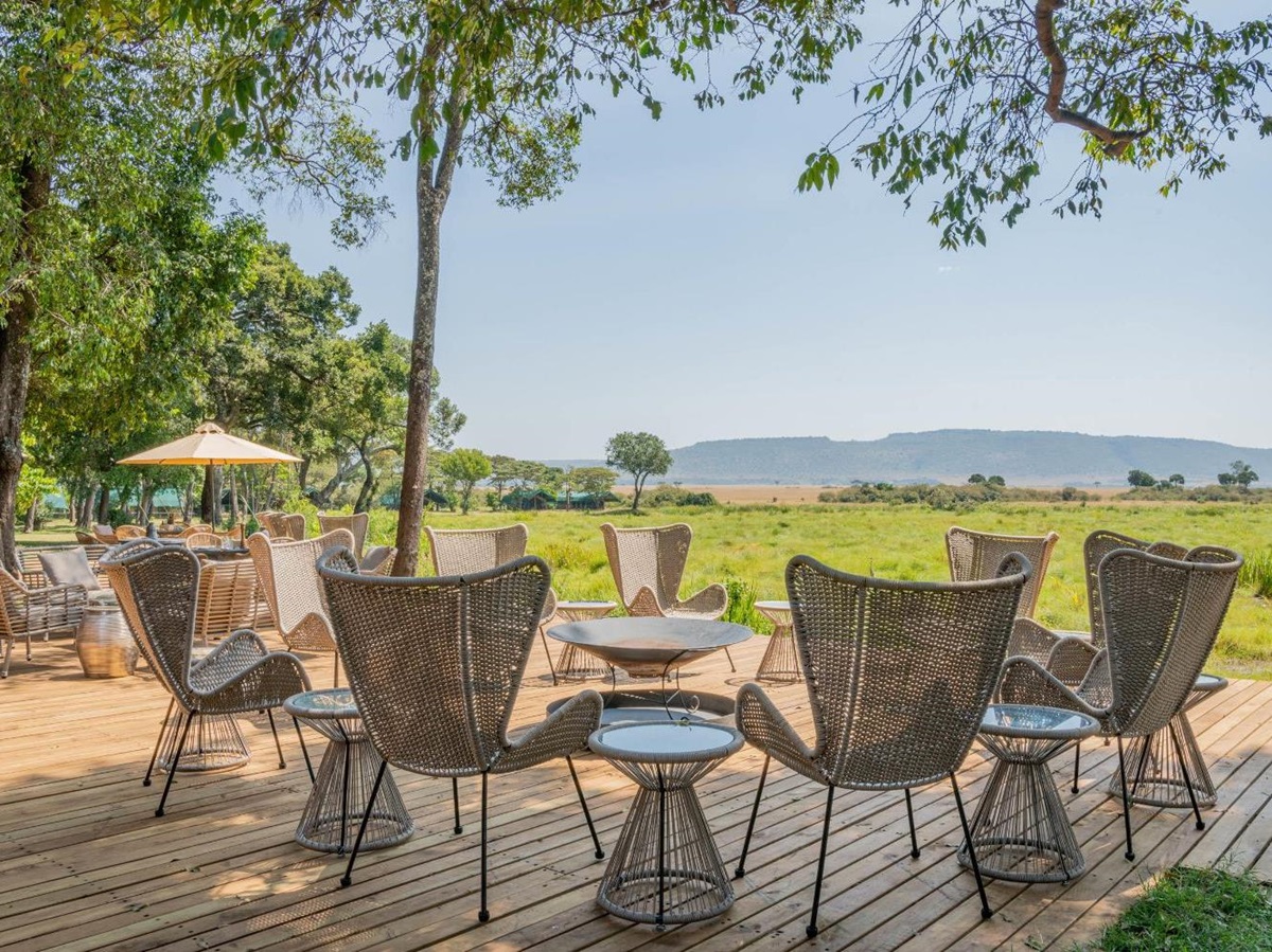 Outdoor seating and campfire at Little Governors Camp, Kenya