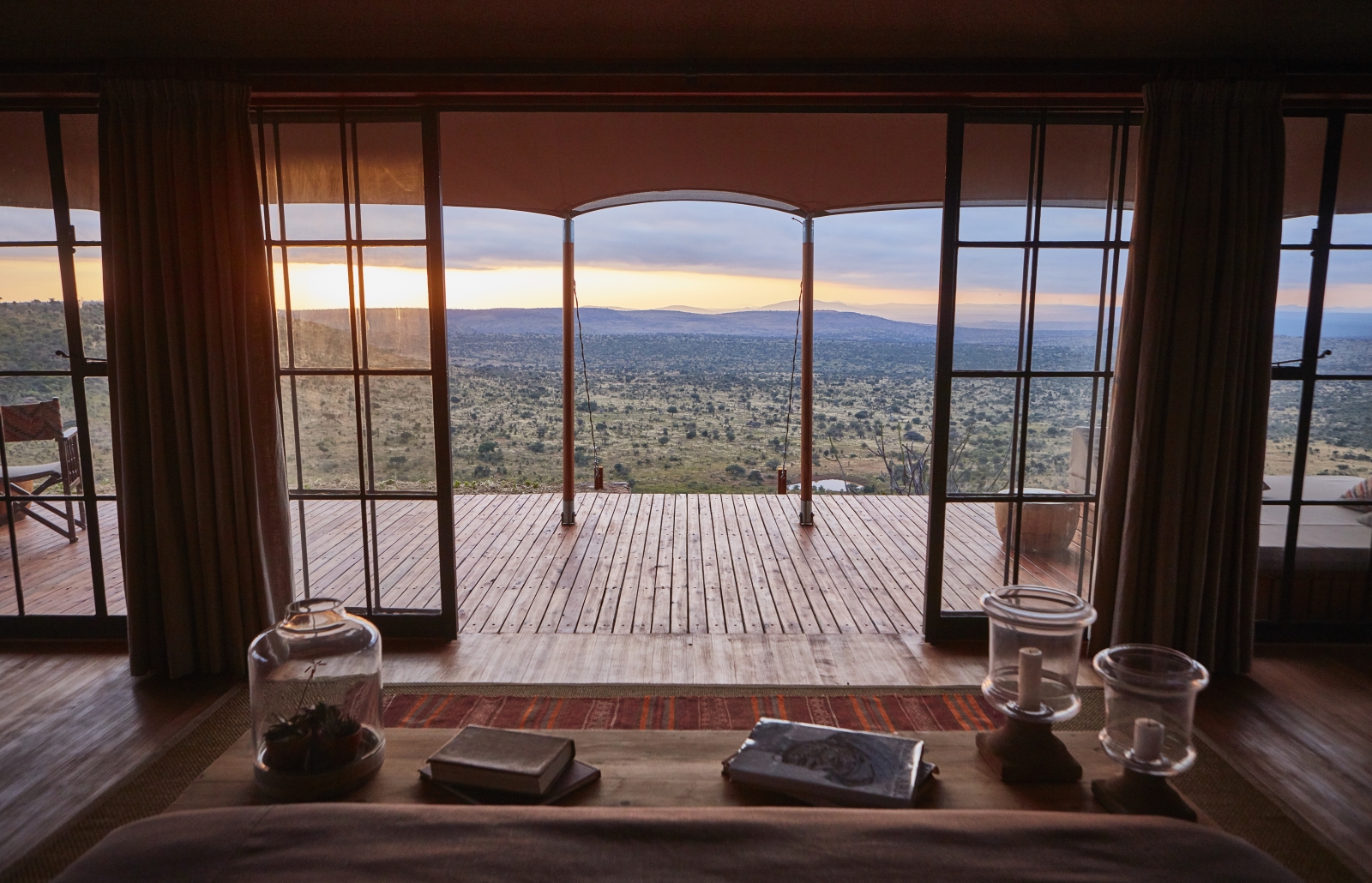 View from a luxury double tented room over the surrounding area at luxury safari lodge Lodo Springs in the Laikipia region of Kenya