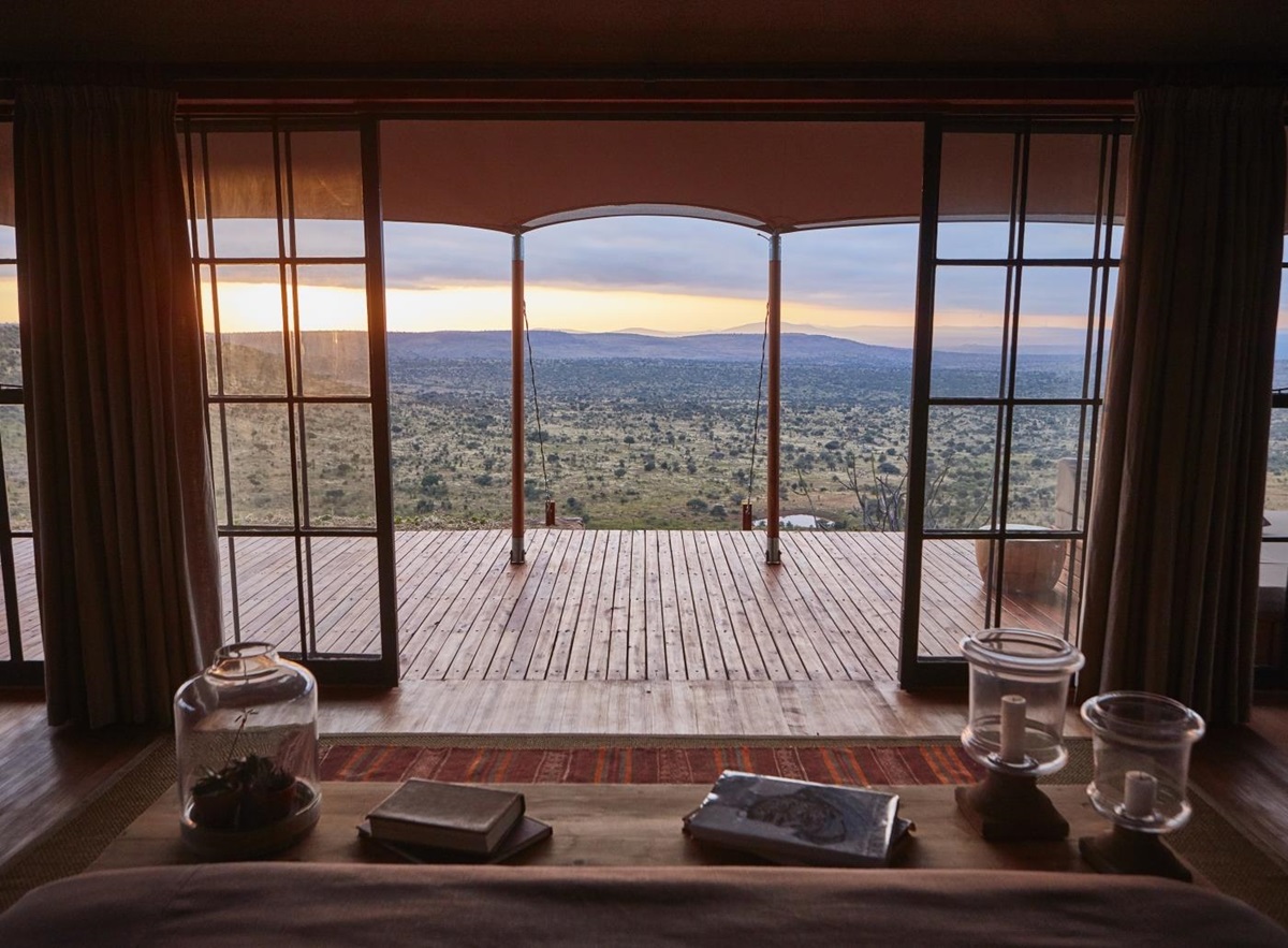 View from a luxury double tented room over the surrounding area at luxury safari lodge Lodo Springs in the Laikipia region of Kenya