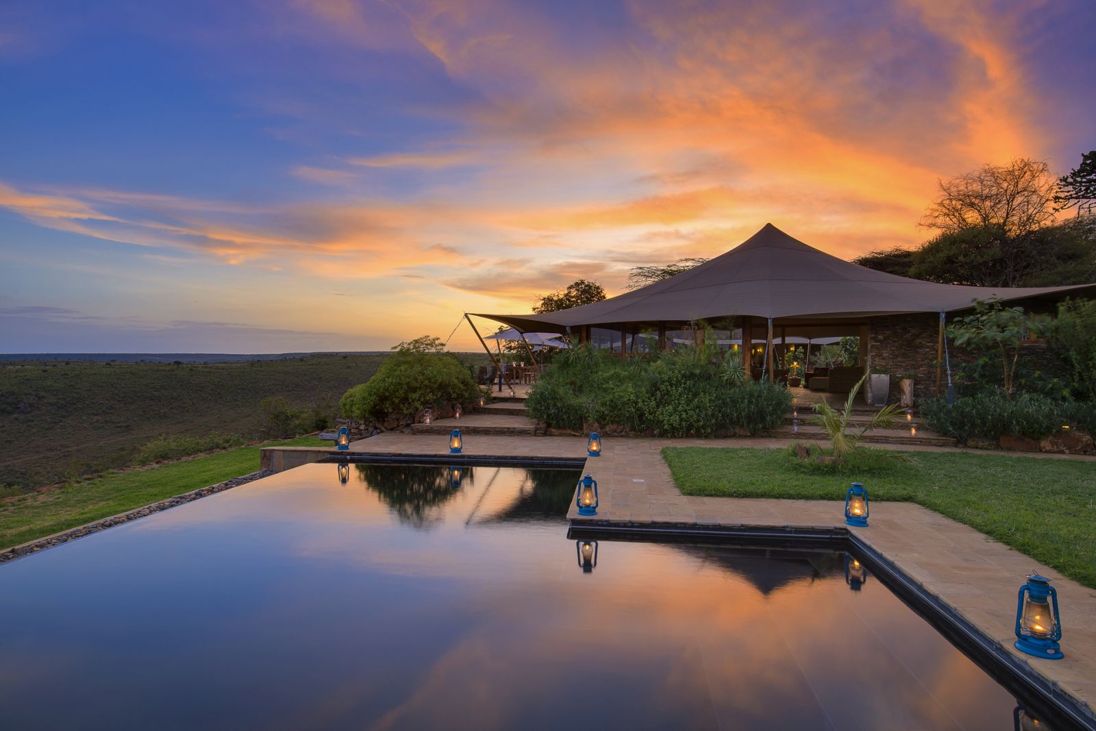 Sunrise over the pool at Loisaba Tented Camp in Kenya