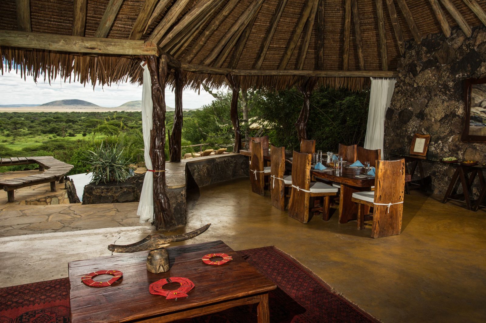 Open-sided dining area of luxury lodge Ol Donyo in Kenya