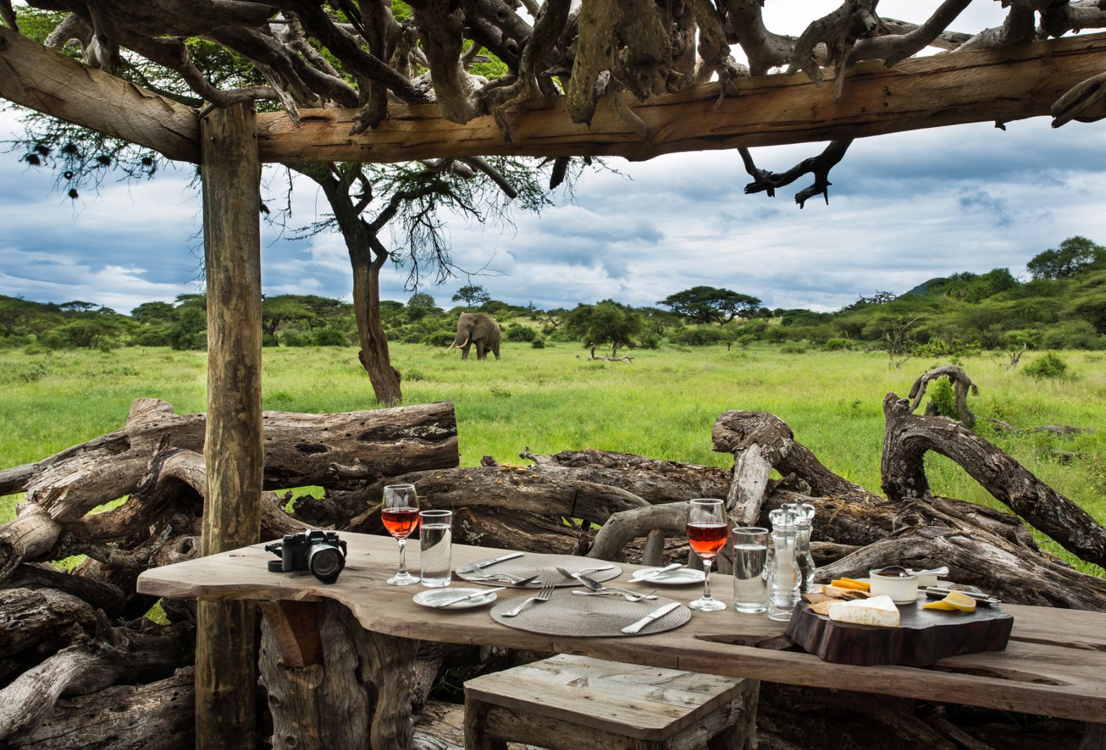 Photographic hide set up with drink and snacks ready for guests watching an elephant during a stay at luxury lodge Ol Donyo in Kenya