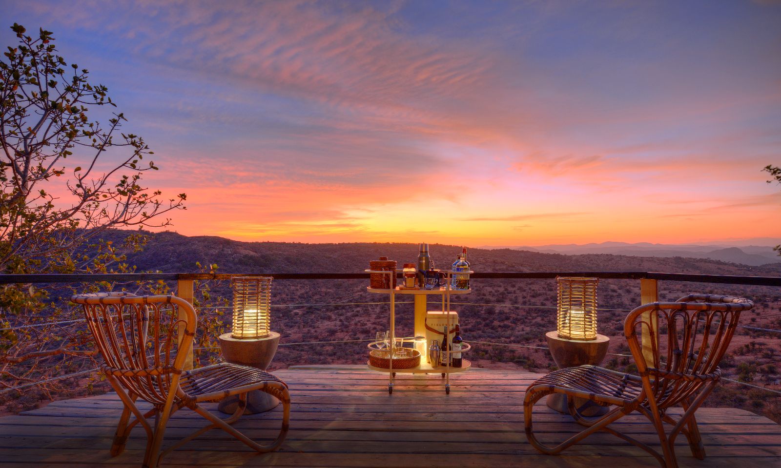 Private terrace of Acacia cottage at sunset at Ol Lentille in Kenya