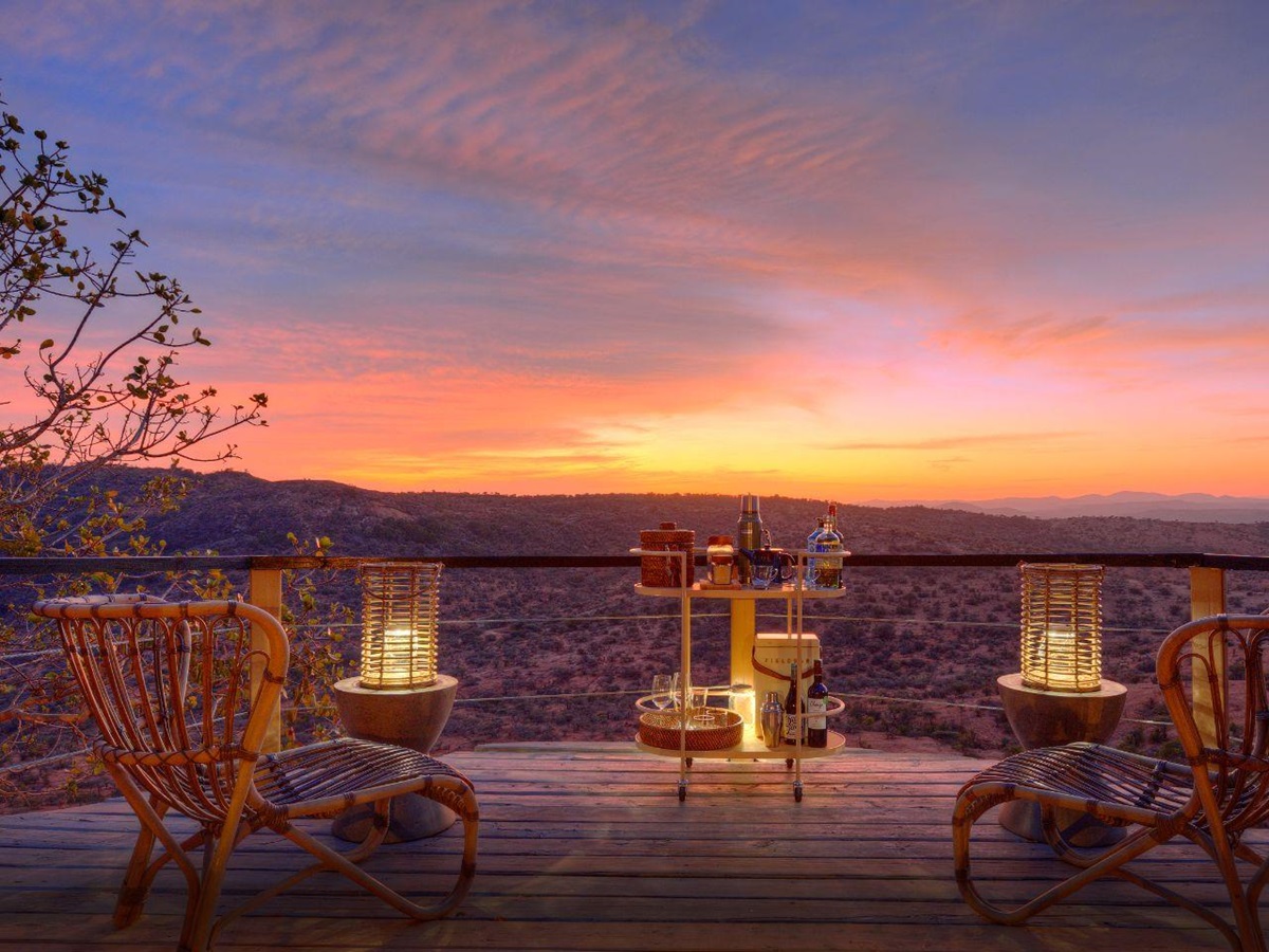 Private terrace of Acacia cottage at sunset at Ol Lentille in Kenya