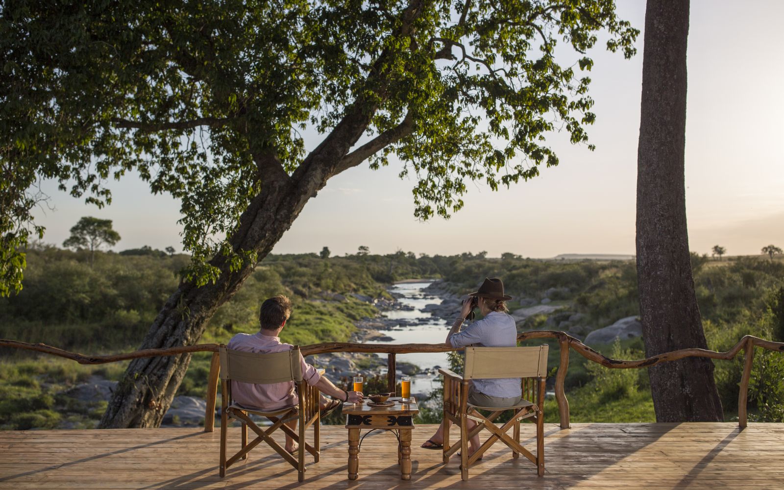 Drinks overlooking the river at Rekero Camo in Kenya 