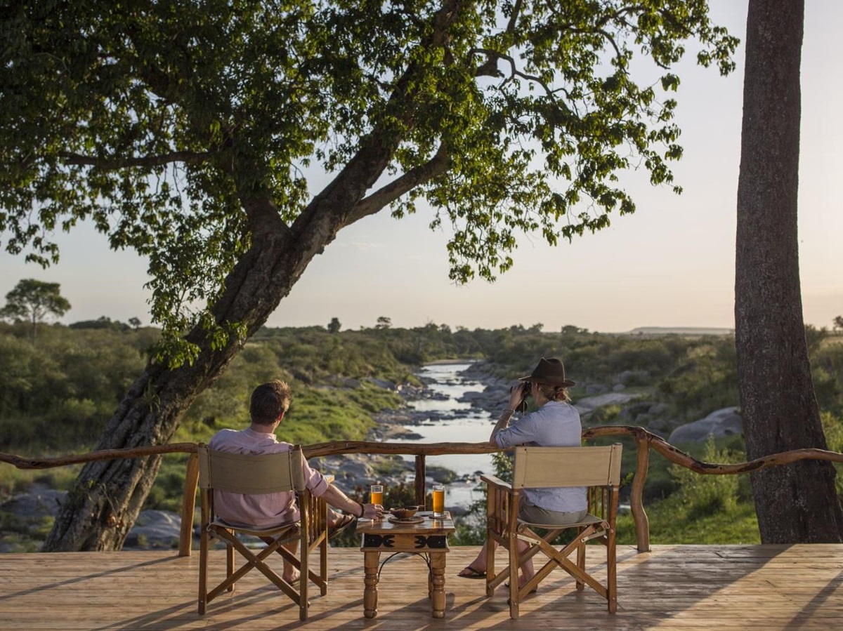 Drinks overlooking the river at Rekero Camo in Kenya