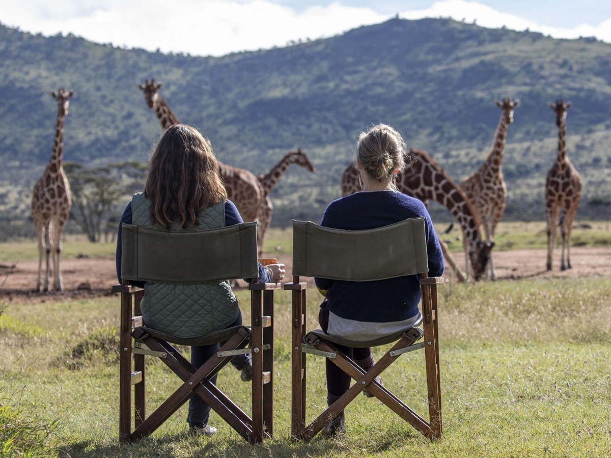 Giraffe watching on the grounds of Enasoit private house on the Laikipia Plateau in Kenya