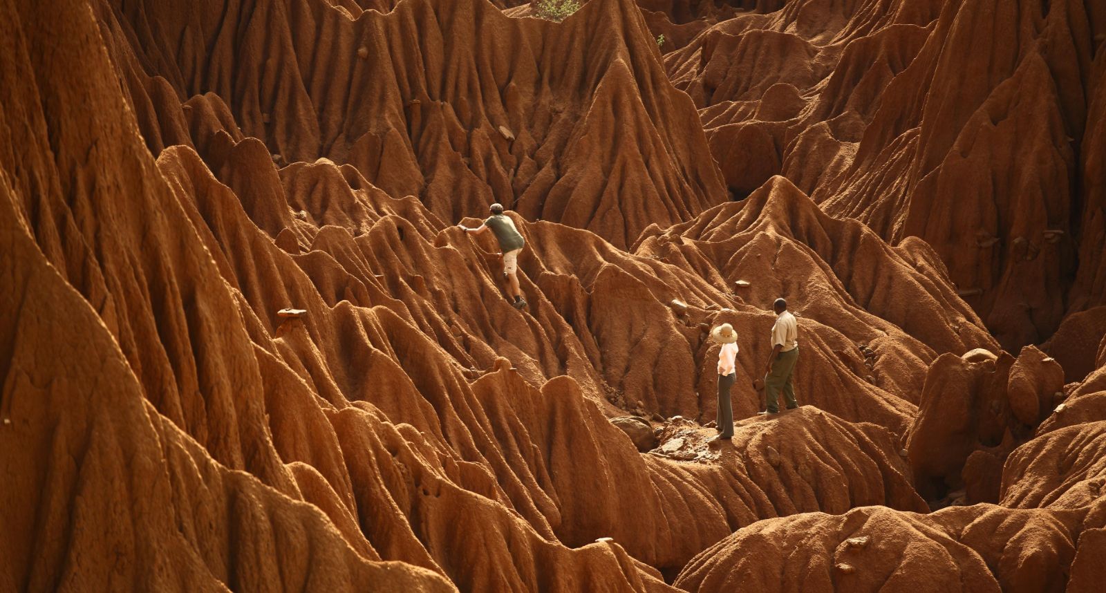 People exploring a canyon on the Ol Jogi Conservancy from Ol Jogi house in Keyna