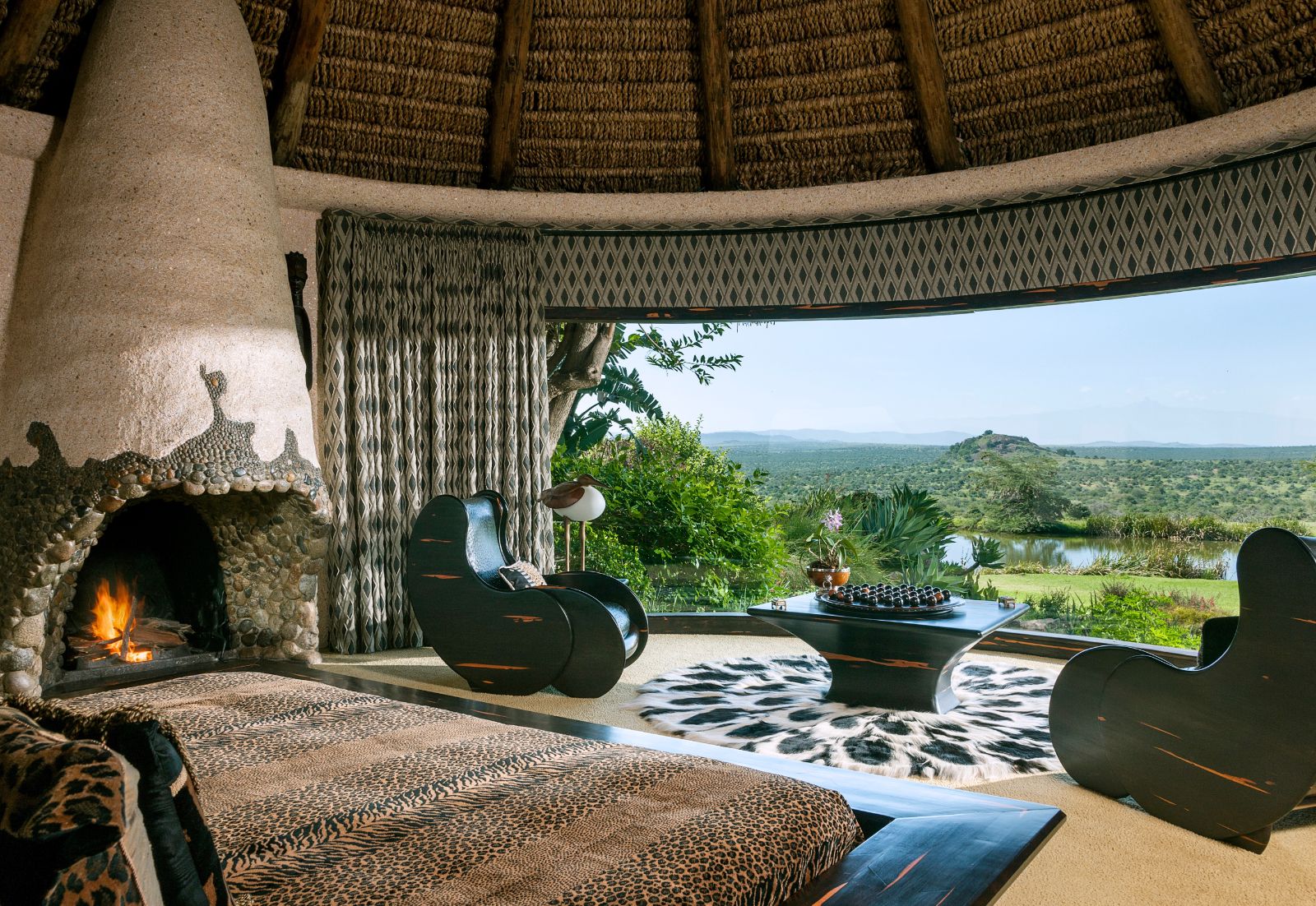Cottage views from a guest suite bedroom at Ol Jogi private house on the Ol Jogi Conservancy in Kenya