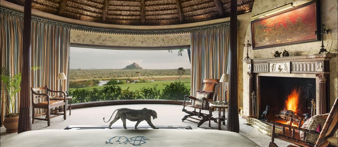 view out of the bedroom at  the luxury villa Ol Jogi in Kenya