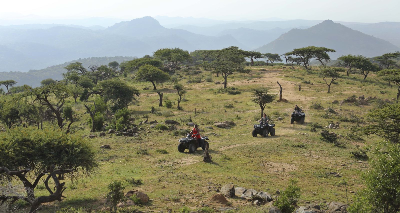 Quad biking through the conservancy at The Sanctuary at Ol Lentille Kenya