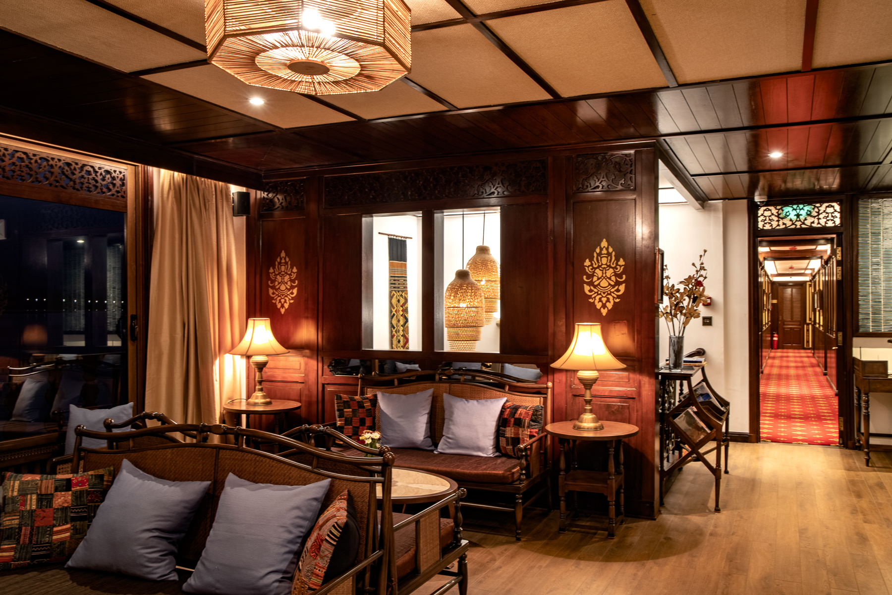 Seating area in the lounge and bar onboard the Anouvong luxury river cruiser on Lao's Upper Mekong
