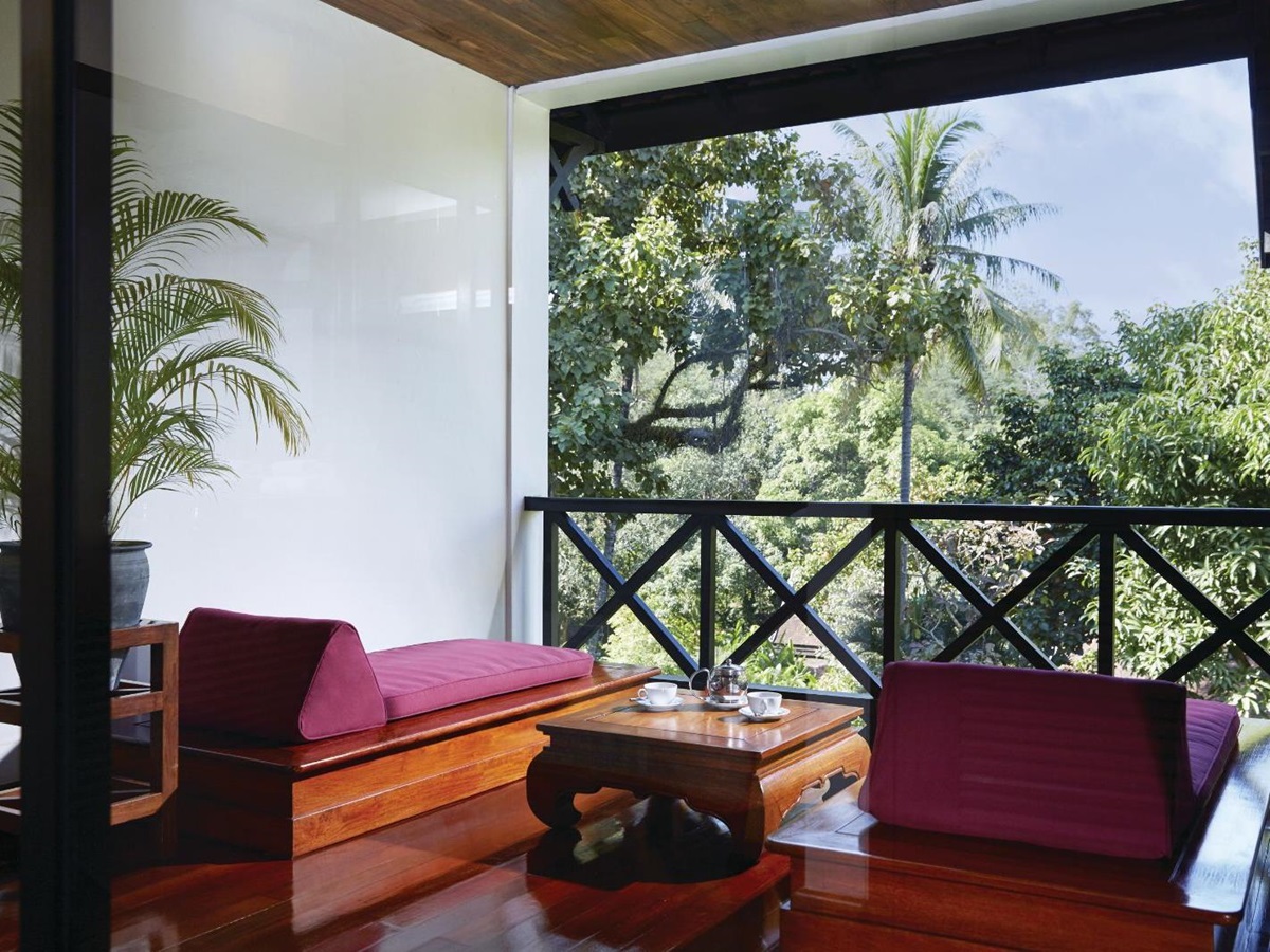 Sunbeds on a balcony at La Residence Phao Vao in Luang Prabang, Laos