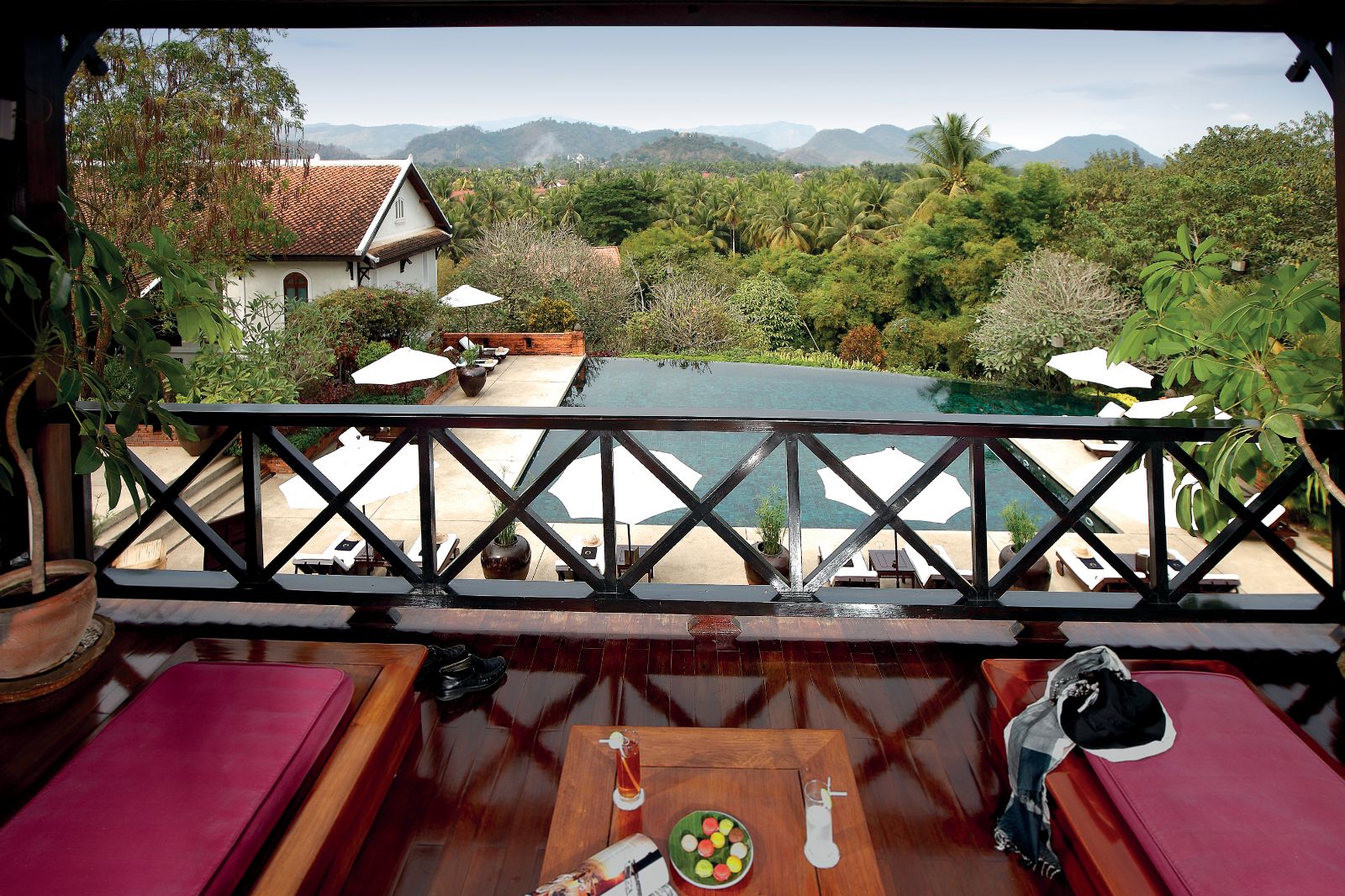 Sunbeds overlooking the pool at La Residence Phao Vao in Luang Prabang, Laos