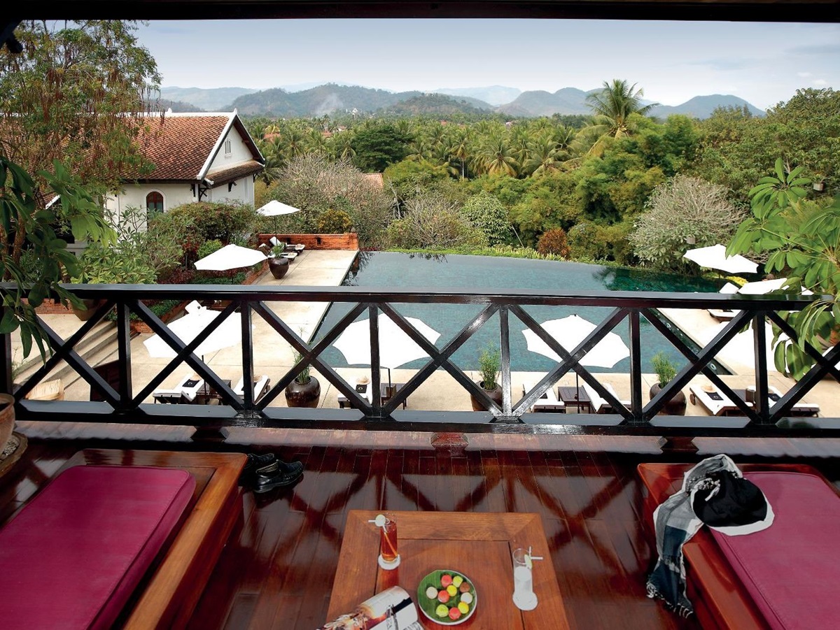 Sunbeds overlooking the pool at La Residence Phao Vao in Luang Prabang, Laos