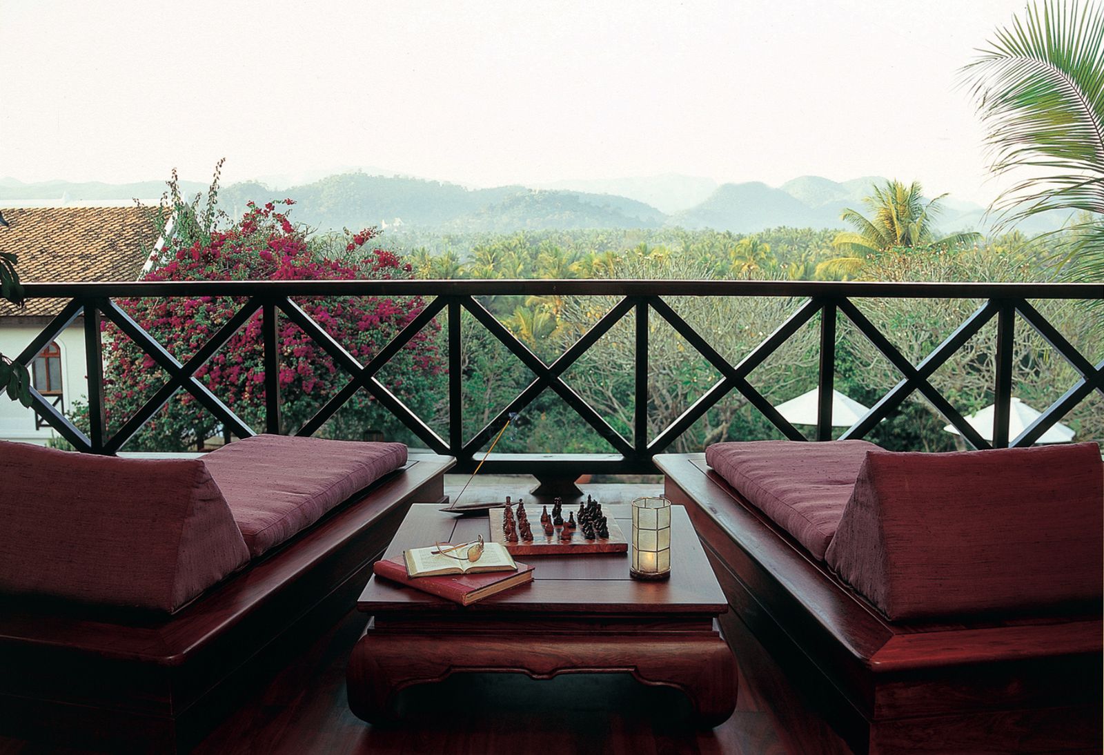 Balcony overlooking grounds of La Residence Phao Vao in Luang Prabang, Laos