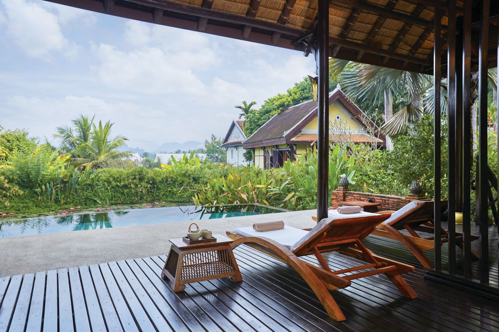Sunbed on the deck of a guest villa at La Residence Phao Vao in Luang Prabang, Laos