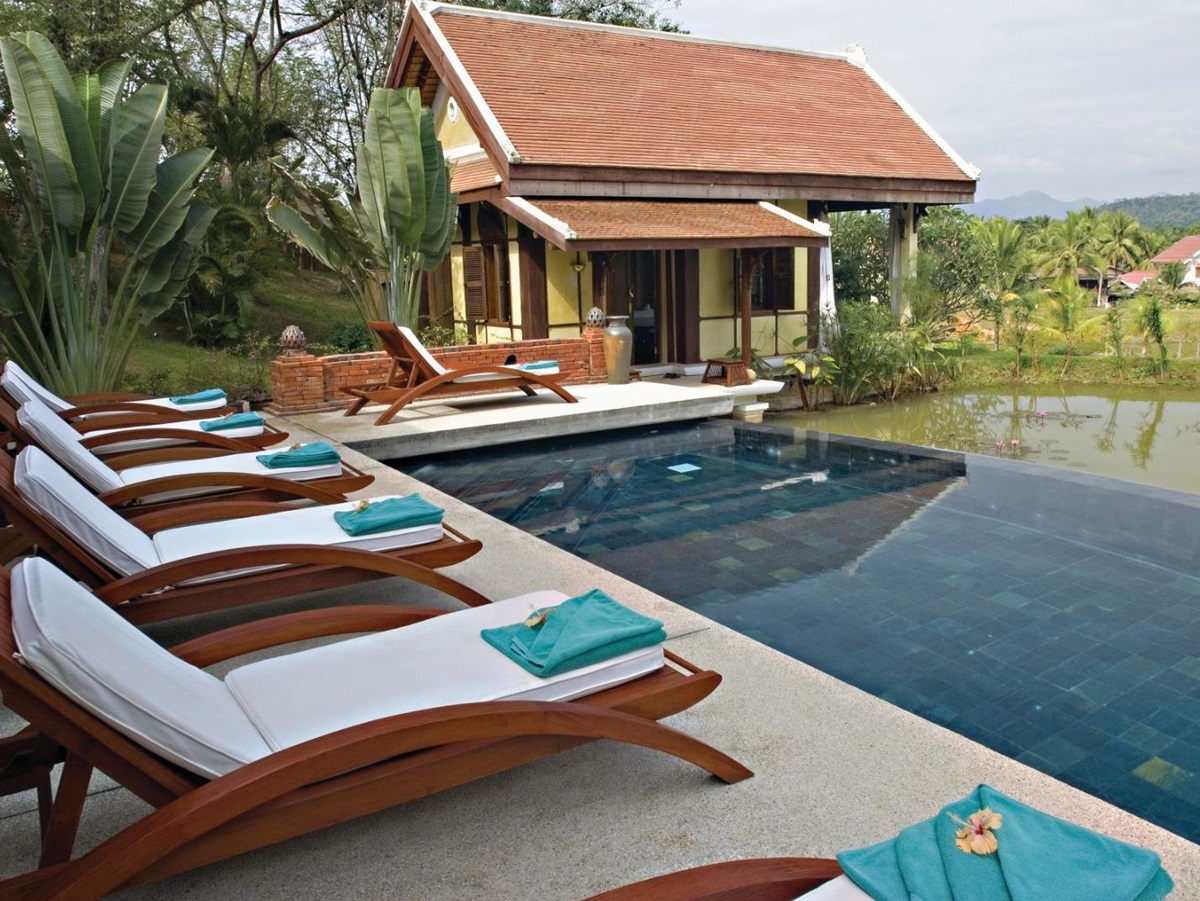 Sunbeds along the poolside at La Residence Phao Vao in Luang Prabang, Laos