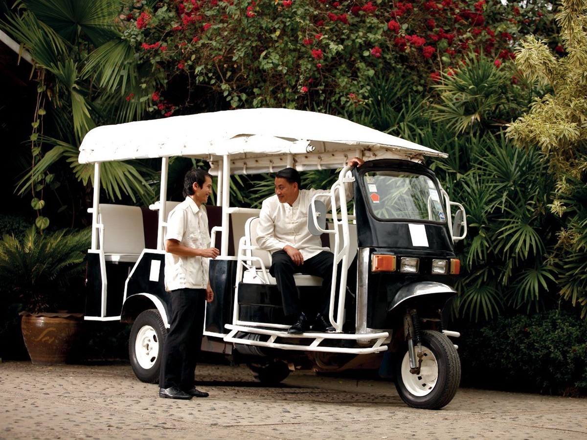 A tuk tuk on the grounds of La Residence Phao Vao in Luang Prabang, Laos