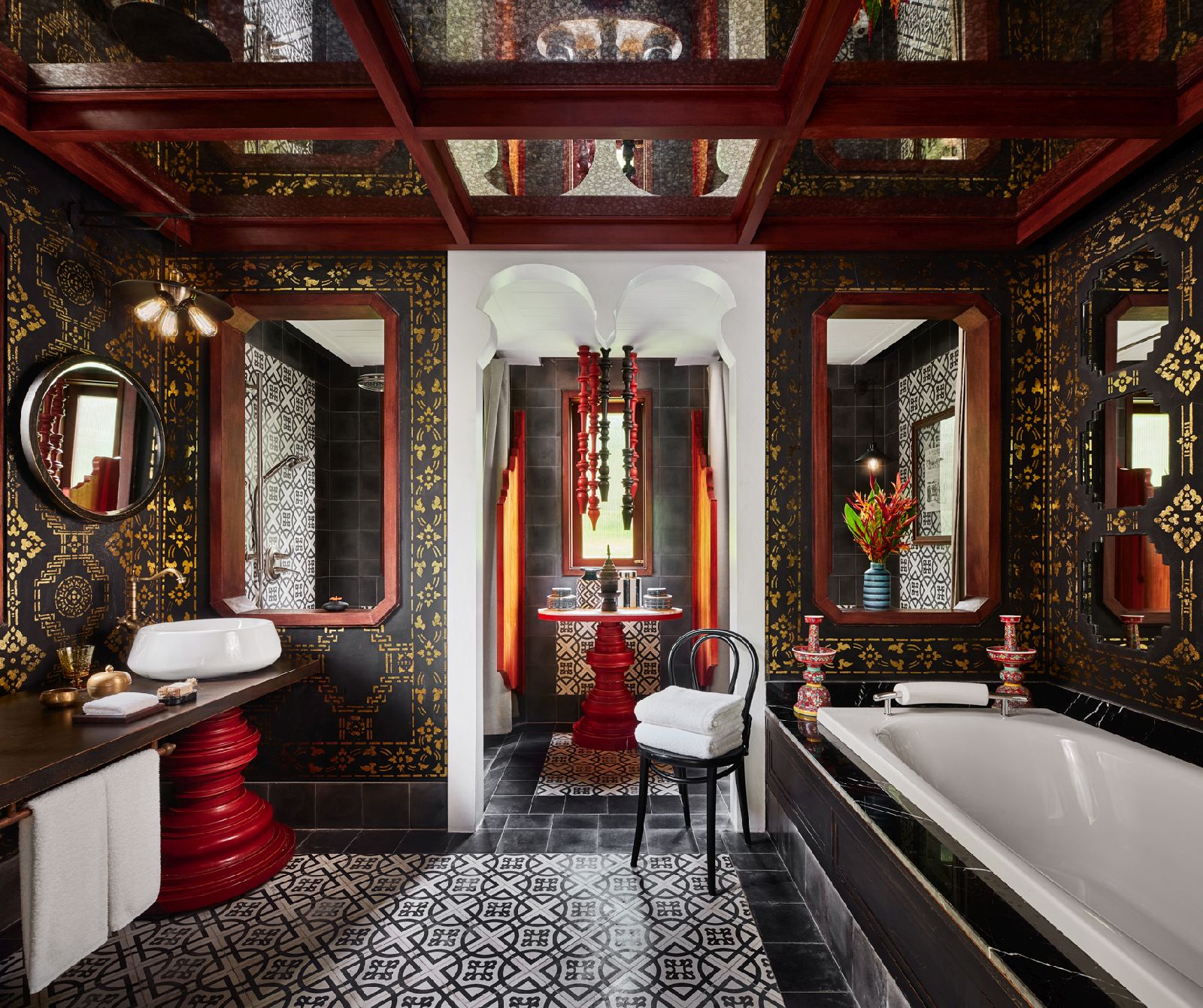 Ornate bathroom of a Riverside Suite at the Rosewood Luang Prabang in Laos