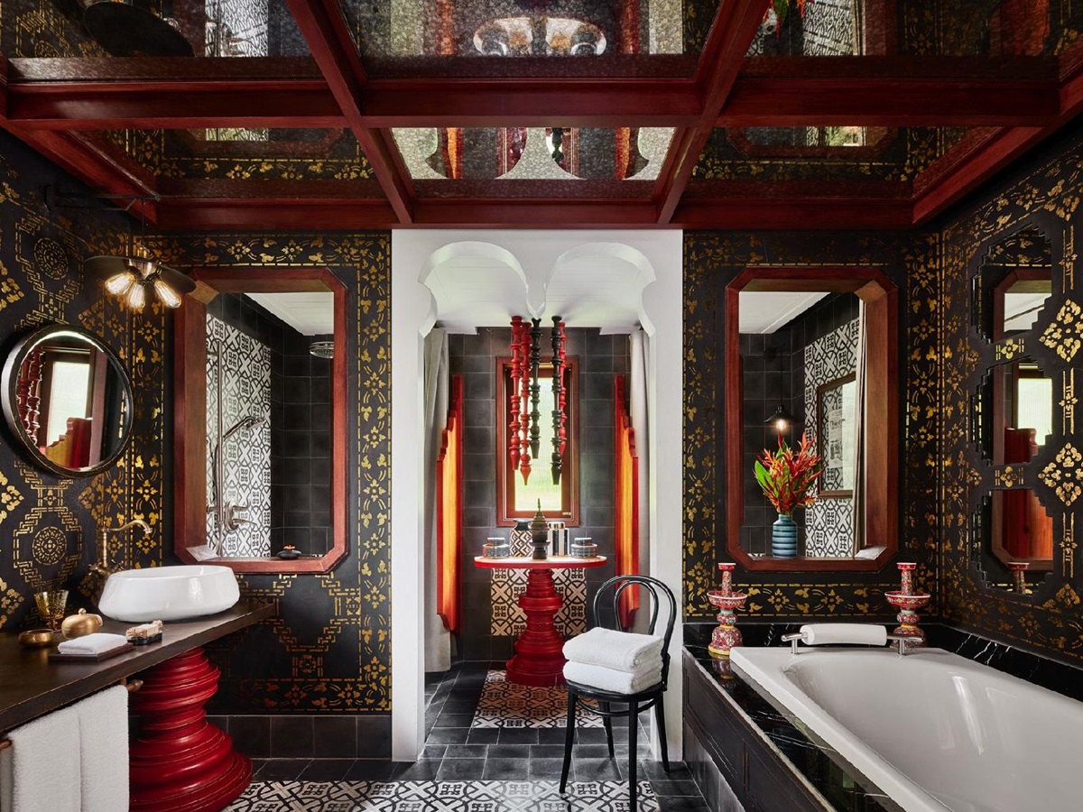 Ornate bathroom of a Riverside Suite at the Rosewood Luang Prabang in Laos
