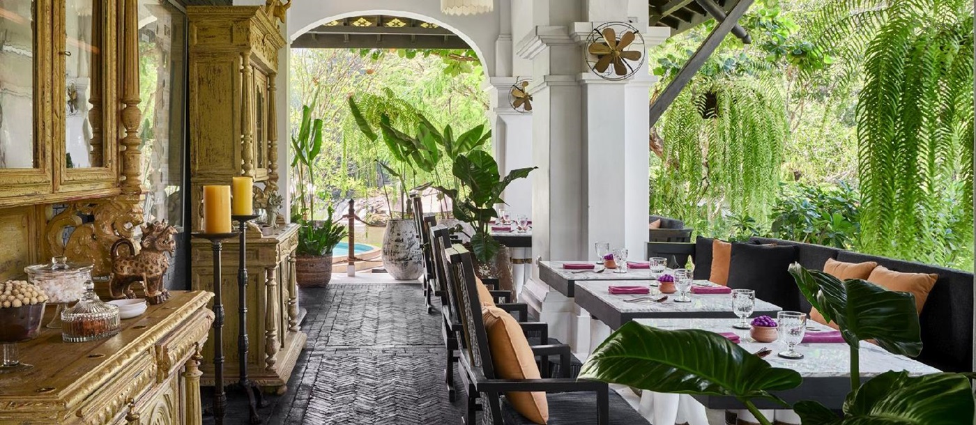 Elegant dining terrace of The Great House at the Rosewood Luang Prabang in Laos