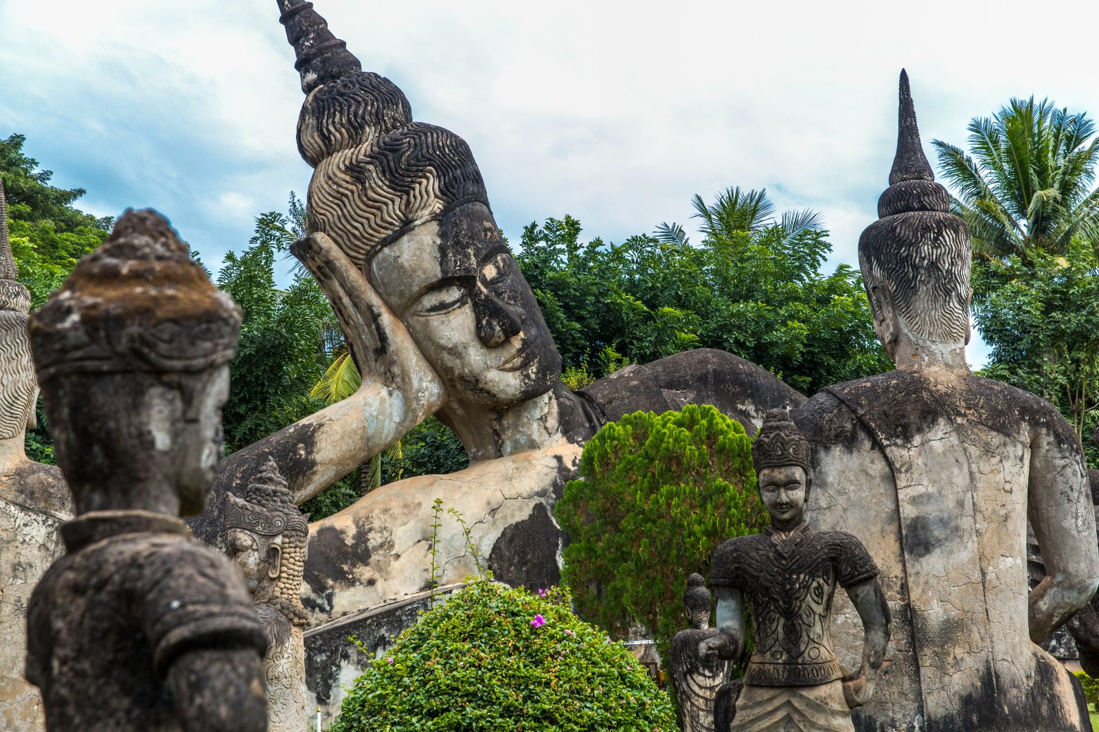 Buddhist statues viewed from the RV Laos Pandaw on the Mekong River in Laos
