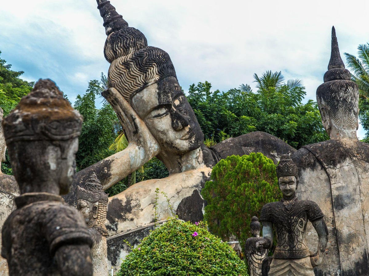 Buddhist statues viewed from the RV Laos Pandaw on the Mekong River in Laos