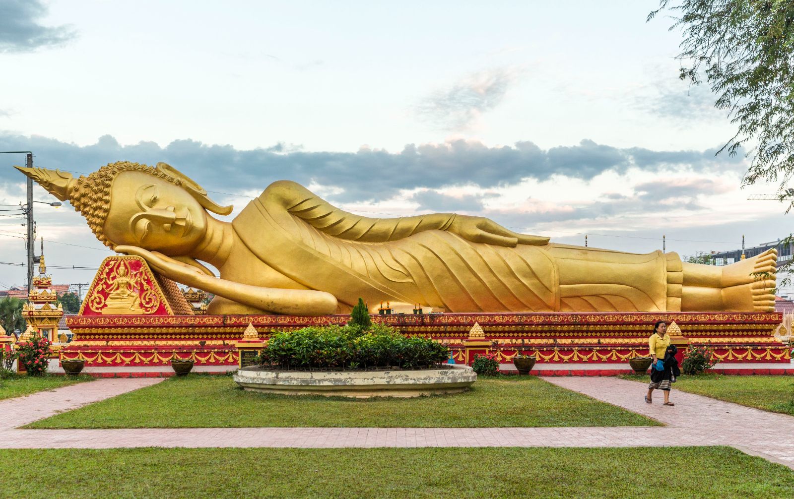 Reclined golden Buddha monument in Laos