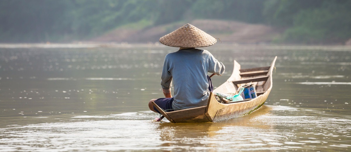 Canoe on the Mekong, Laos