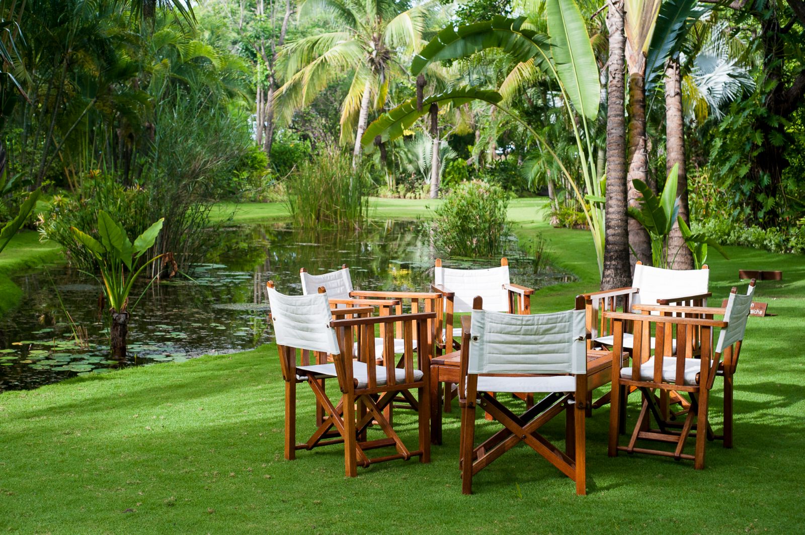 Garden dining setup at Anjajavy L'Hotel in Madagascar