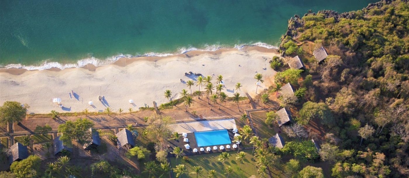 Aerial view of a villa and beachfront at Anjajavy L'Hotel in Madagascar