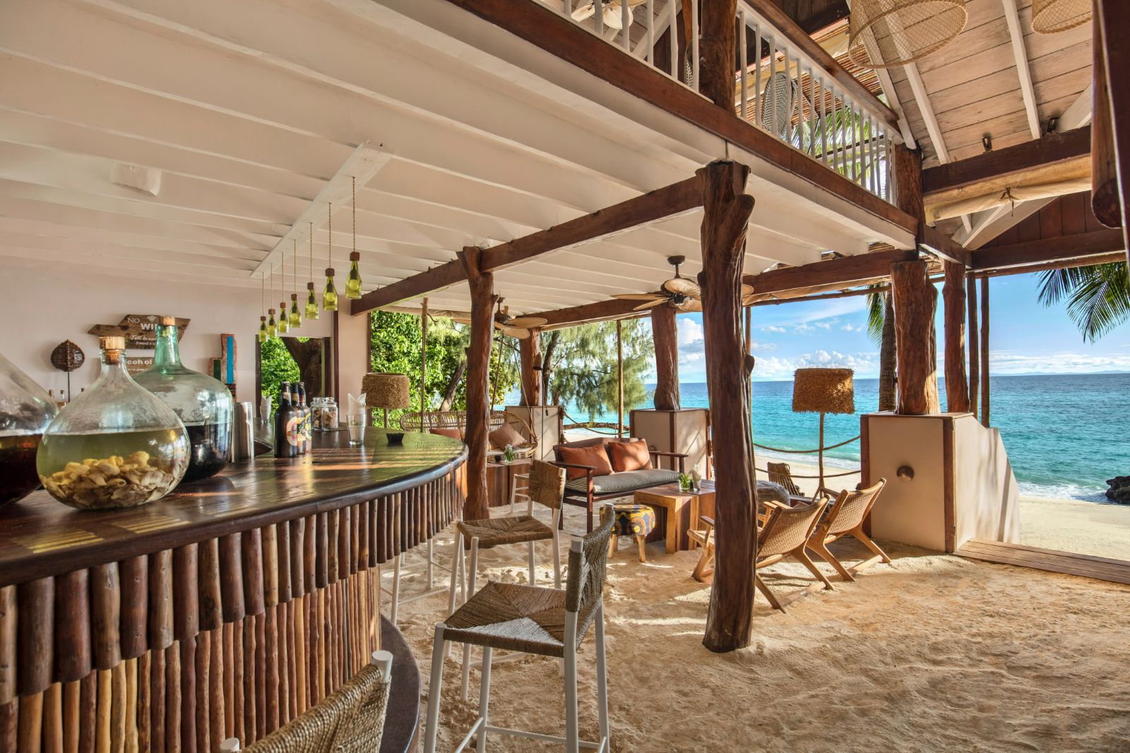The bar with sandy floor at the Constance Tsarabanjina island resort in Madagascar
